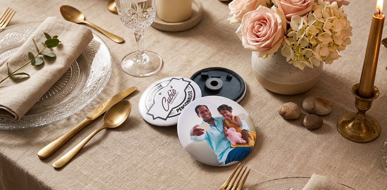 Personalised photo button badges on a wedding table